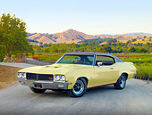 AUT 23 RK1923 01
1970 Buick GS Stage 1 Beige 3/4 Front View On Pavement By Field And Hills