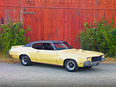 AUT 23 RK1928 01
1970 Buick GS Stage 1 Beige 3/4 Front View On Pavement By Barn
