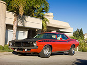 AUT 23 RK1929 01
1970 Plymouth AAR Barracuda Red And Black 3/4 Front View On Pavement By Building
