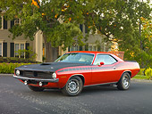 AUT 23 RK1932 01
1970 Plymouth AAR Barracuda Red And Black 3/4 Front View On Pavement By House