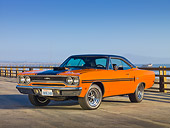 AUT 23 RK1939 01
1970 Plymouth GTX Six Pac Orange And Black 3/4 Front View On Pavement By Ocean