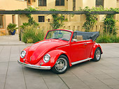 AUT 23 RK1944 01
1970 Volkswagen Beetle Convertible Red 3/4 Front View On Pavement By Building