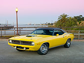 AUT 23 RK2001 01
1970 Plymouth Barracuda 440 Six Pack Yellow 3/4 Front View On Pavement By Water And Palm Trees