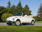 AUT 23 RK2023 01
1979 Volkswagen Bug Convertible White 3/4 Side View On Pavement By Grass And Trees