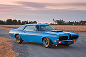 AUT 23 RK2026 01
1970 Mercury Cougar Eliminator Blue 3/4 Front View On Pavement By Dry Grass At Dusk