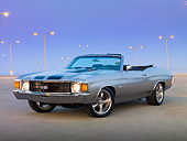 AUT 23 RK2089 01
1972 Chevrolet Chevelle Silver With Black Stripe 3/4 Front View On Pavement By Street Lamps