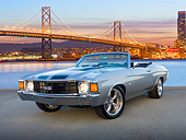 AUT 23 RK2092 01
1972 Chevrolet Chevelle Silver With Black Stripe 3/4 Front View On Pavement By San Francisco Bay Bridge