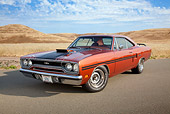 AUT 23 RK2115 01
1970 Plymouth GTX Burnt Orange With Black Stripe 3/4 Front View On Pavement By Dry Grass