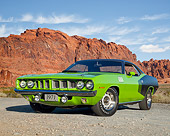 AUT 23 RK2131 01
1971 Plymouth Hemi Cuda Sassy Grass Green 3/4 Front View On Pavement By Trees