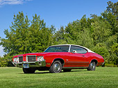 AUT 23 RK2163 01
1971 Oldsmobile Cutlass S Red With White Roof 3/4 Front View On Grass By Trees