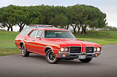 AUT 23 RK2166 01
1971 Oldsmobile Vista Cruiser Red 3/4 Front View On Road By Trees
