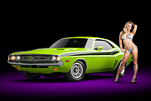 AUT 23 RK2193 01
1971 Dodge Challenger RT Sublime 3/4 Front View In Studio With Swimsuit Model