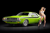 AUT 23 RK3370 01
1971 Dodge Challenger RT Sublime 3/4 Front View On Pavement With Swimsuit Model