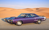 AUT 23 RK3388 01
1970 Dodge Super Bee Purple 3/4 Side View On Gravel By Sand Dunes