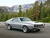 AUT 23 RK3398 01
1970 AMC AMX Silver And Black 3/4 Front View On Pavement By Mountains And Trees