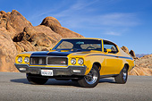 AUT 23 RK3406 01
1970 Buick GSX Saturn Yellow And Black 3/4 Front View On Pavement By Boulders