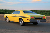 AUT 23 RK3429 01
1971 Dodge Demon Yellow With Black Stripes 3/4 Rear View On Pavement By Vineyard At Dusk