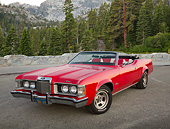 AUT 23 RK3431 01
1973 Mercury Cougar Convertible Red 3/4 Front View On Pavement By Evergreen Trees