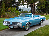 AUT 23 RK3460 01
1970 Oldsmobile 442 Convertible Blue 3/4 Front View On Concrete By Trees