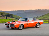 AUT 23 BK0017 01
1971 Dodge Charger 440 Magnum R/T Orange 3/4 Front View On Pavement By Hill