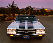 AUT 23 RK0036 03
1970 Chevrolet Chevelle 396 Silver With Black Stripes Head On Shot On Pavement Filtered