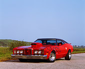 AUT 23 RK0061 08
1972 Mercury Montego GT Red With Flames 3/4 Front View On Pavement Blue Sky