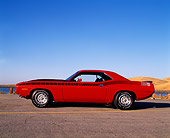 AUT 23 RK0175 03
1970 Plymouth AAR Barracuda Red And Black Profile On Pavement Blue Sky