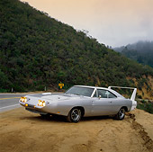 AUT 23 RK0216 07
1970 Dodge Charger Daytona Silver 3/4 Front View On Dirt By Mountains