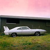 AUT 23 RK0221 04
1970 Dodge Charger Daytona Silver Profile View On Grass By Building
