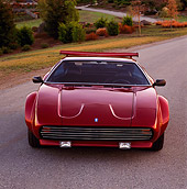 AUT 23 RK0236 02
1972 De Tomaso Pantera Burgundy Head On Shot On Pavement