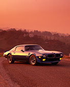 AUT 23 RK0279 02
1970 Pontiac Firebird Trans Am Blue 3/4 Front View On Pavement Filtered