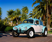 AUT 23 RK0406 01
1970 VW Baja Bug Light Blue And White 3/4 Front View On Pavement By Palm Trees Blue Sky