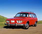 AUT 23 RK0413 04
1974 VW 412 Estate Wagon Red Low 3/4 Front View On Dirt Blue Sky
