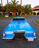 AUT 23 RK0434 01
1979 Lincoln Continental Lowrider Blue Wide Angle Head On Shot On Pavement Palm Trees