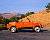 AUT 23 RK0442 01
1973 Volkswagen Thing Type 181 Orange Profile On Pavement By Dry Grass Hills