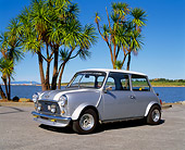 AUT 23 RK0481 01
1973 Austin Mini Cooper Modified Silver White Stripe Side 3/4 View On Pavement