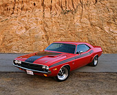 AUT 23 RK0524 01
1971 Dodge Challenger 426 Hemi Red And Black 3/4 Front View Against Rock