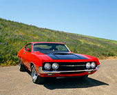 AUT 23 RK0537 02
1970 Ford Torino Red And Black 3/4 Front View On Pavement By Hill Blue Sky