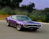 AUT 23 RK0606 01
1971 Plymouth Hemi GTX Purple 3/4 Front View On Pavement By Trees And Bushes