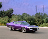AUT 23 RK0608 02
1971 Plymouth Hemi GTX Purple 3/4 Side View On Pavement By Trees