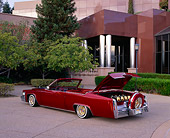 AUT 23 RK0784 01
1977 Cadillac Coupe Deville Convertible Red 3/4 Rear View Trunk Open By Museum