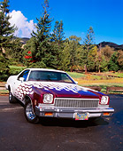 AUT 23 RK0804 01
1973 Chevrolet El Camino White Burgundy Flames Slanted 3/4 Front View On Pavement Trees Background