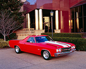 AUT 23 RK0807 01
1970 Chevrolet El Camino SS 454 Red With White Stripes 3/4 Front View On Pavement By Museum