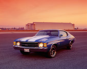 AUT 23 RK0816 02
1971 Chevrolet Chevelle 454 SS Blue White Stripes 3/4 Front View On Pavement By Airplane Hanger