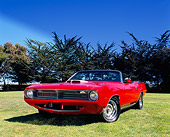 AUT 23 RK0873 03
1970 Plymouth 'Cuda Convertible Red Low 3/4 Front View On Grass By Trees