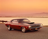 AUT 23 RK0887 05
1970 Dodge Challenger T/A 340 Burnt Orange 3/4 Side View On Pavement By Water