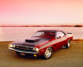 AUT 23 RK0888 01
1970 Dodge Challenger T/A 340  Burnt Orange 3/4 Front View On Pavement By Water