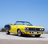 AUT 23 RK0927 01
1971 Plymouth Hemi Cuda Convertible Yellow And Black 3/4 Front View On Pavement Blue Sky