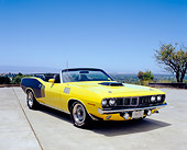 AUT 23 RK0928 04
1971 Plymouth Hemi Cuda Convertible Yellow And Black 3/4 Front View On Pavement Blue Sky