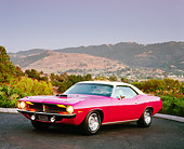 AUT 23 RK0941 04
1970 Plymouth Hemi Cuda Pink And White 3/4 Side View On Pavement Mountains Background